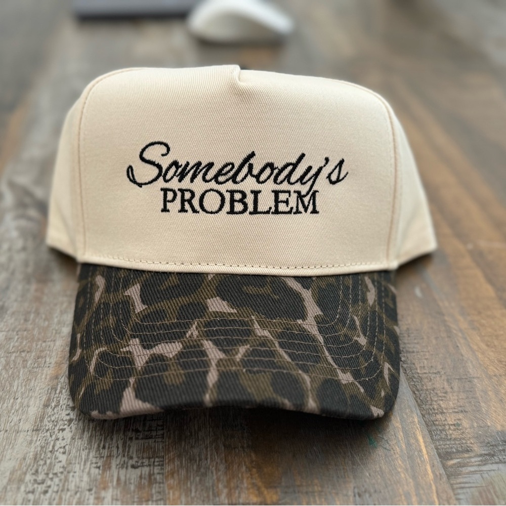 “Somebody’s problem” hat